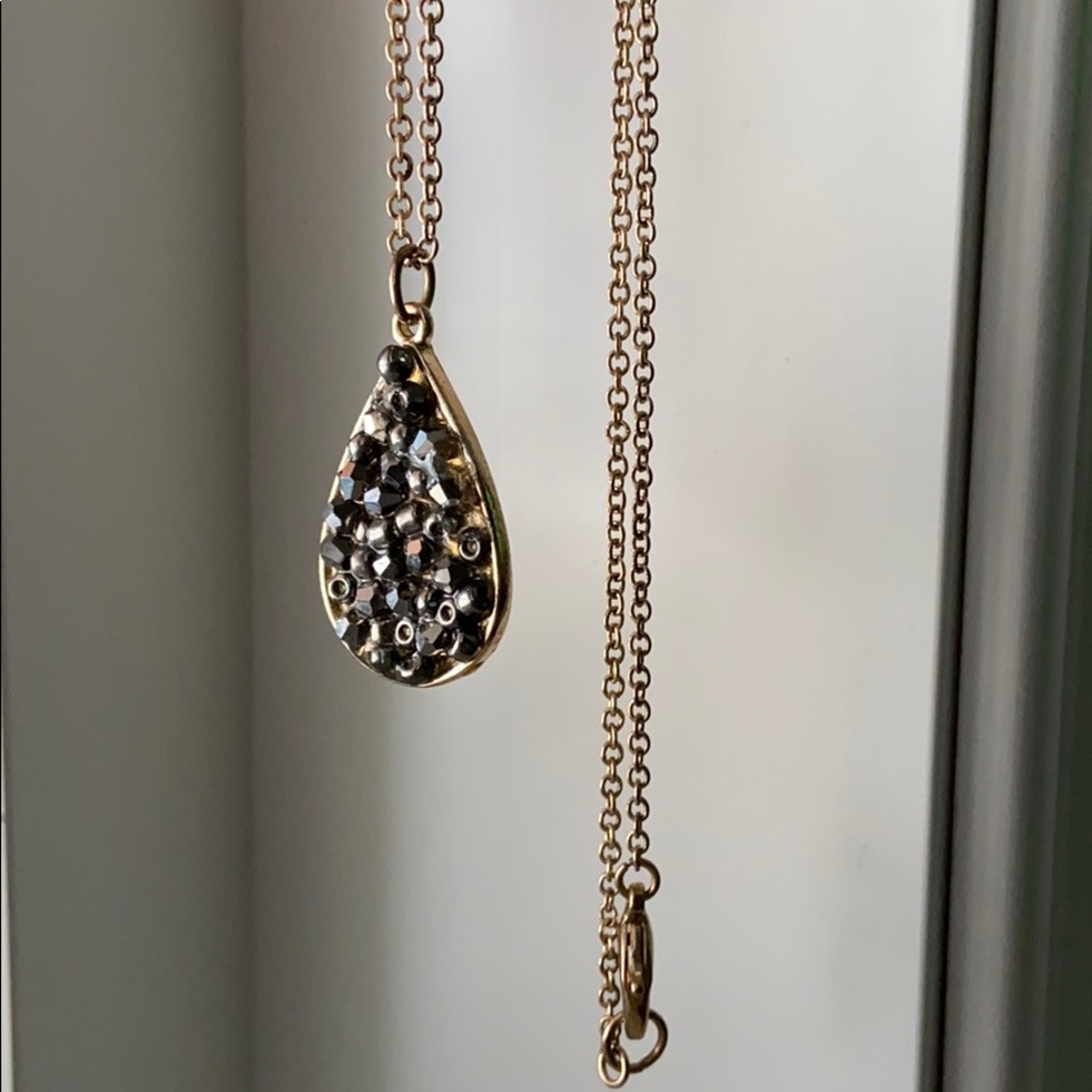 Gold necklace with black gem detail - long chain